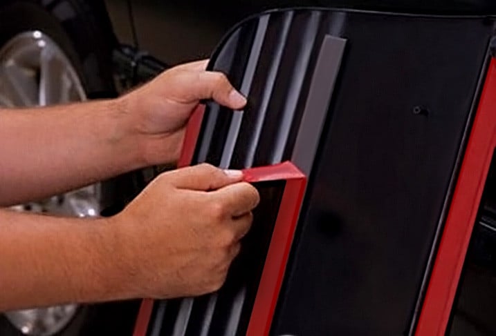 Peeling Away Protective Backing From Deflector