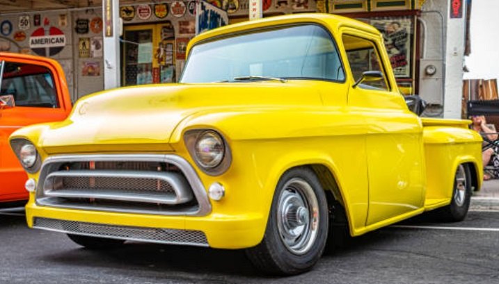 Gaylord Traditional Hinged Tonneau Covers On Yellow Truck