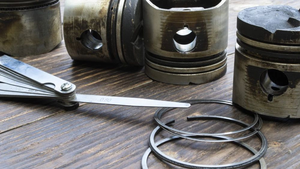 Old car engine pistons.