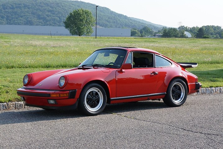 Porsche 911 In Stock Form With Aftermarket Rear Spoiler