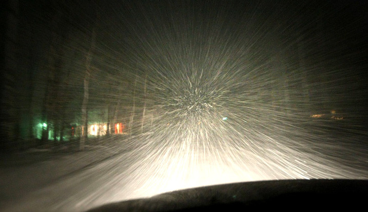 Driving Through Snow Storm In Wintry Climate