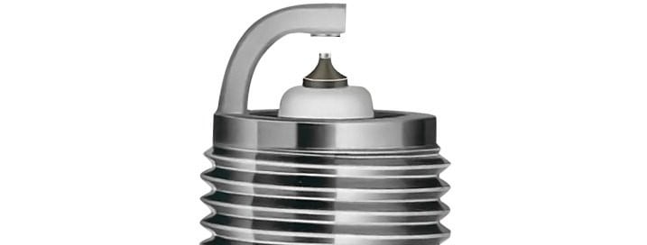 Spark Plug Tip With Metal Coating