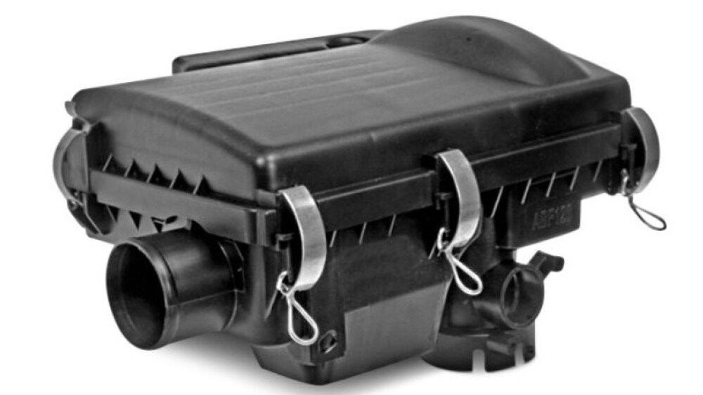 A stock image of an engine air filter housing