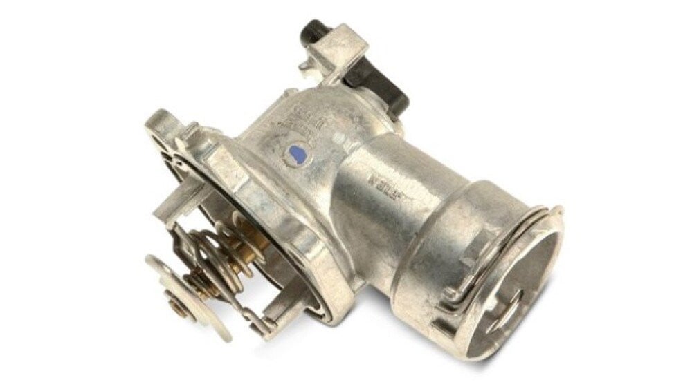 Thermostat in a housing