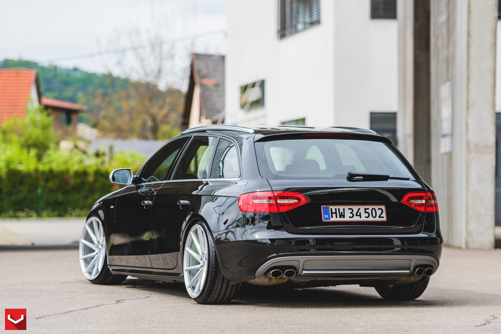 Rear Bumper Cover with Dual Exhaust Tips on Audi A4 - Photo by Vossen