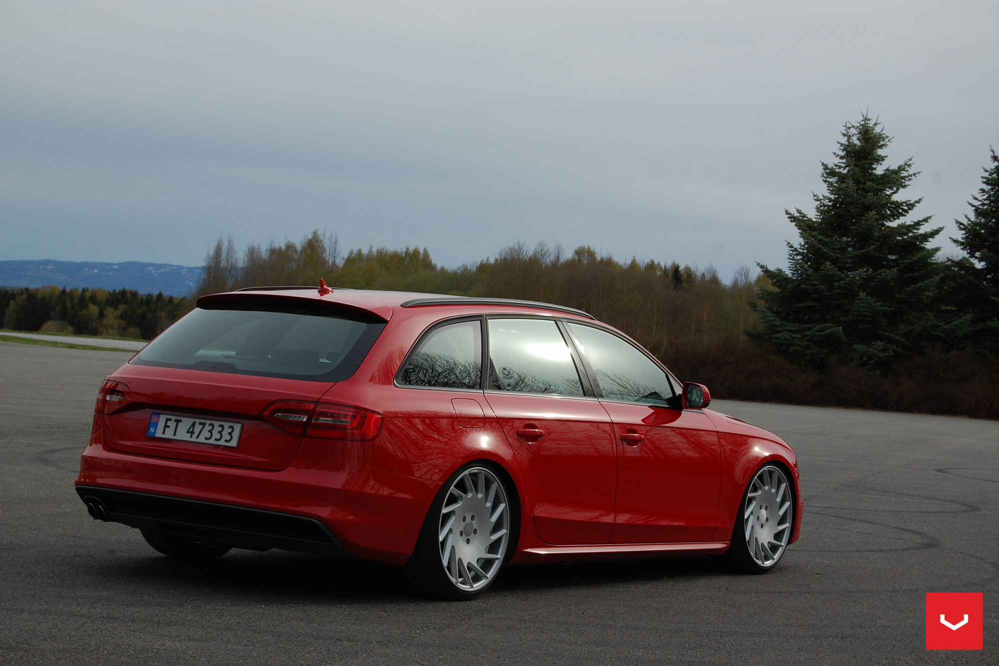 Red Audi A4 with Aftermarket Roofline Spoiler - Photo by Vossen