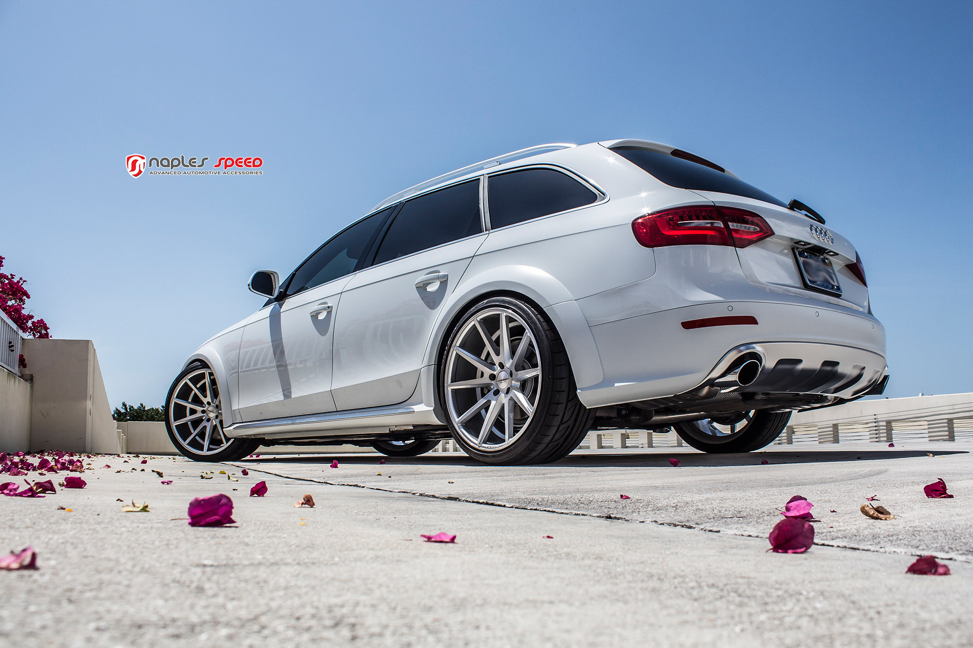 Rear Bumper Cover with Single Exhaust Tips on White Audi A4 - Photo by Vossen