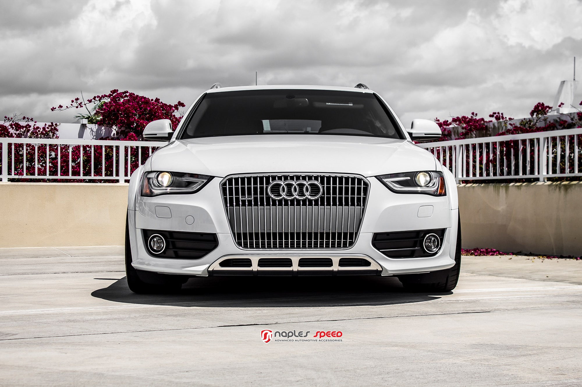 White Audi A4 with Custom Chrome Front Bumper Cover - Photo by Vossen