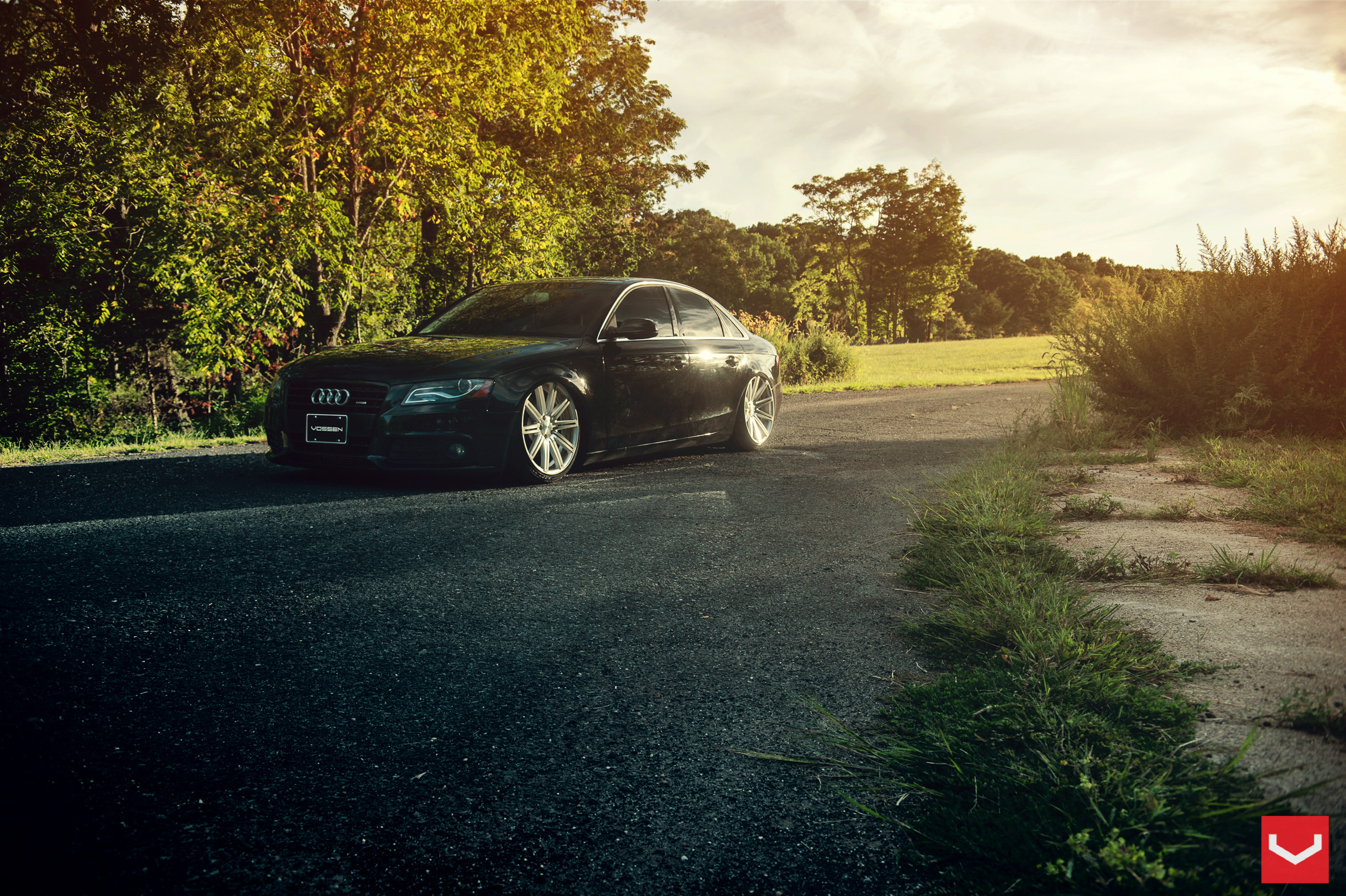 Aftermarket LED Headlights on Black Audi A4 - Photo by Vossen