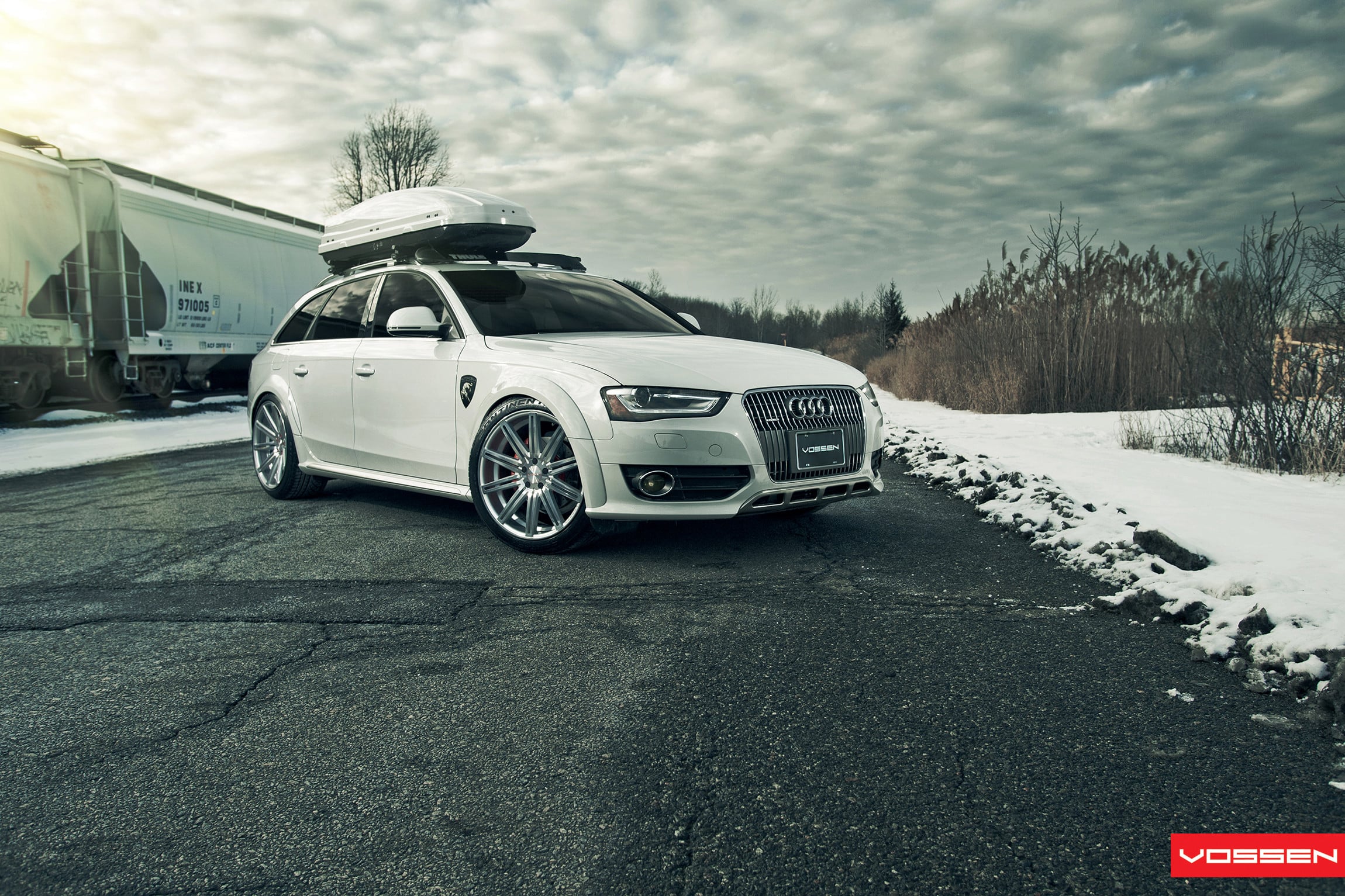 White Audi A4 with Thule Roof Rack - Photo by Vossen