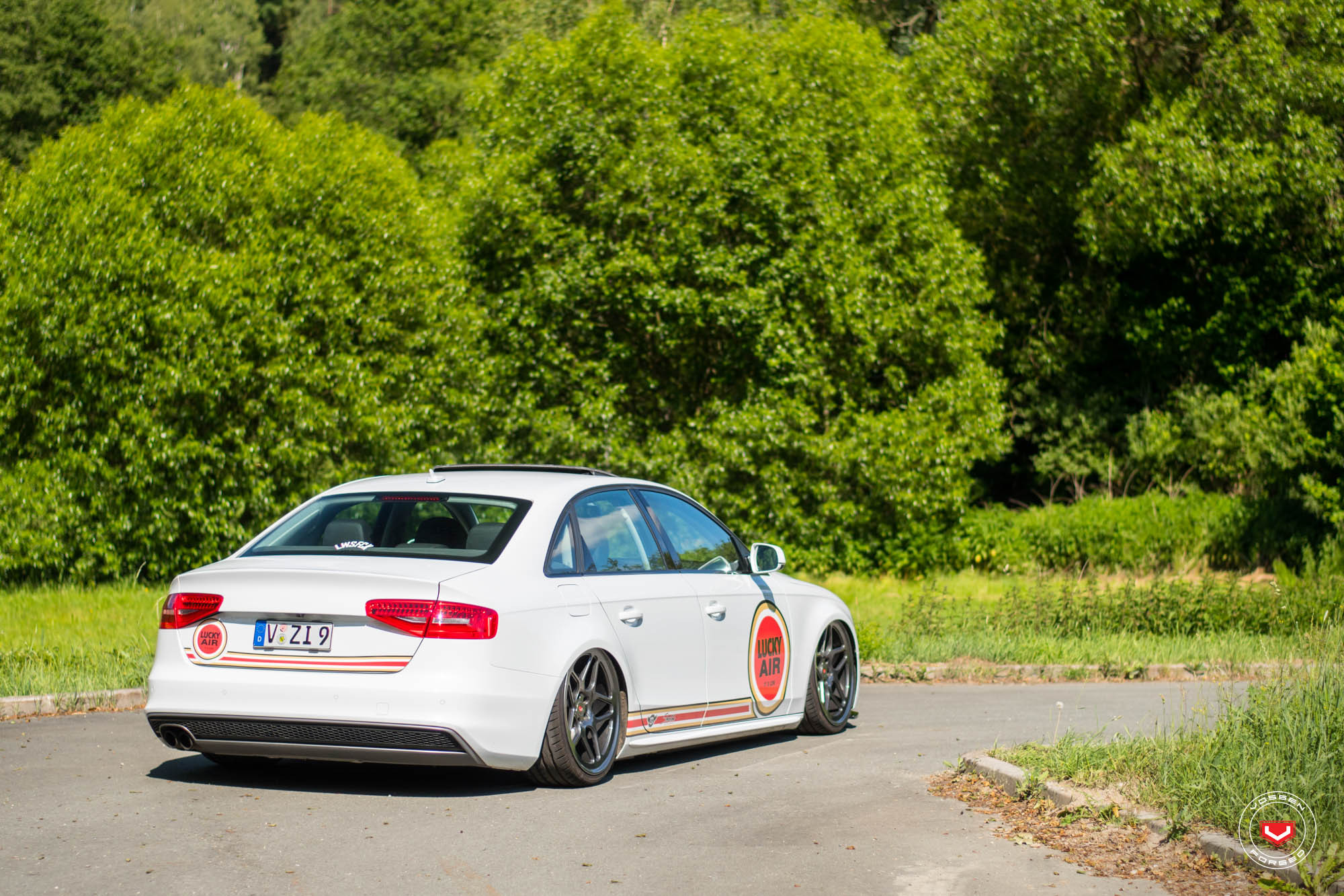 White Audi A4 Aftermarket Rear Diffuser - Photo by Vossen
