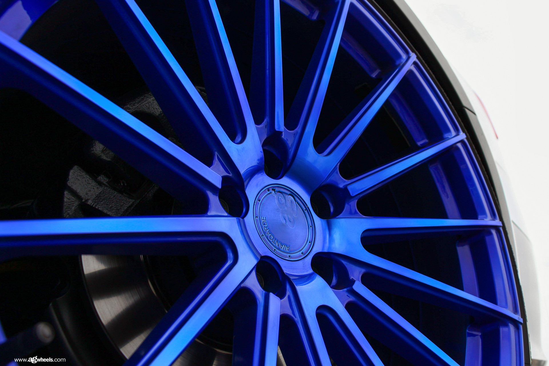 White Audi A4 with Custom Blue Avant Garde Wheels - Photo by Avant Garde Wheels