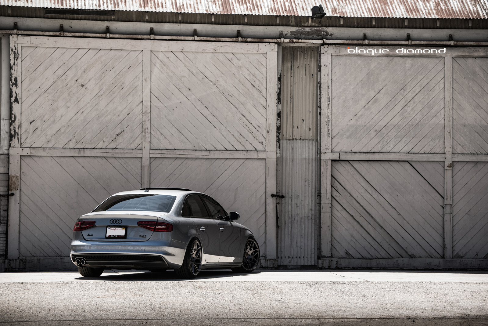 Red Smoke Taillights on Gray Audi A4 - Photo by Blaque Diamond