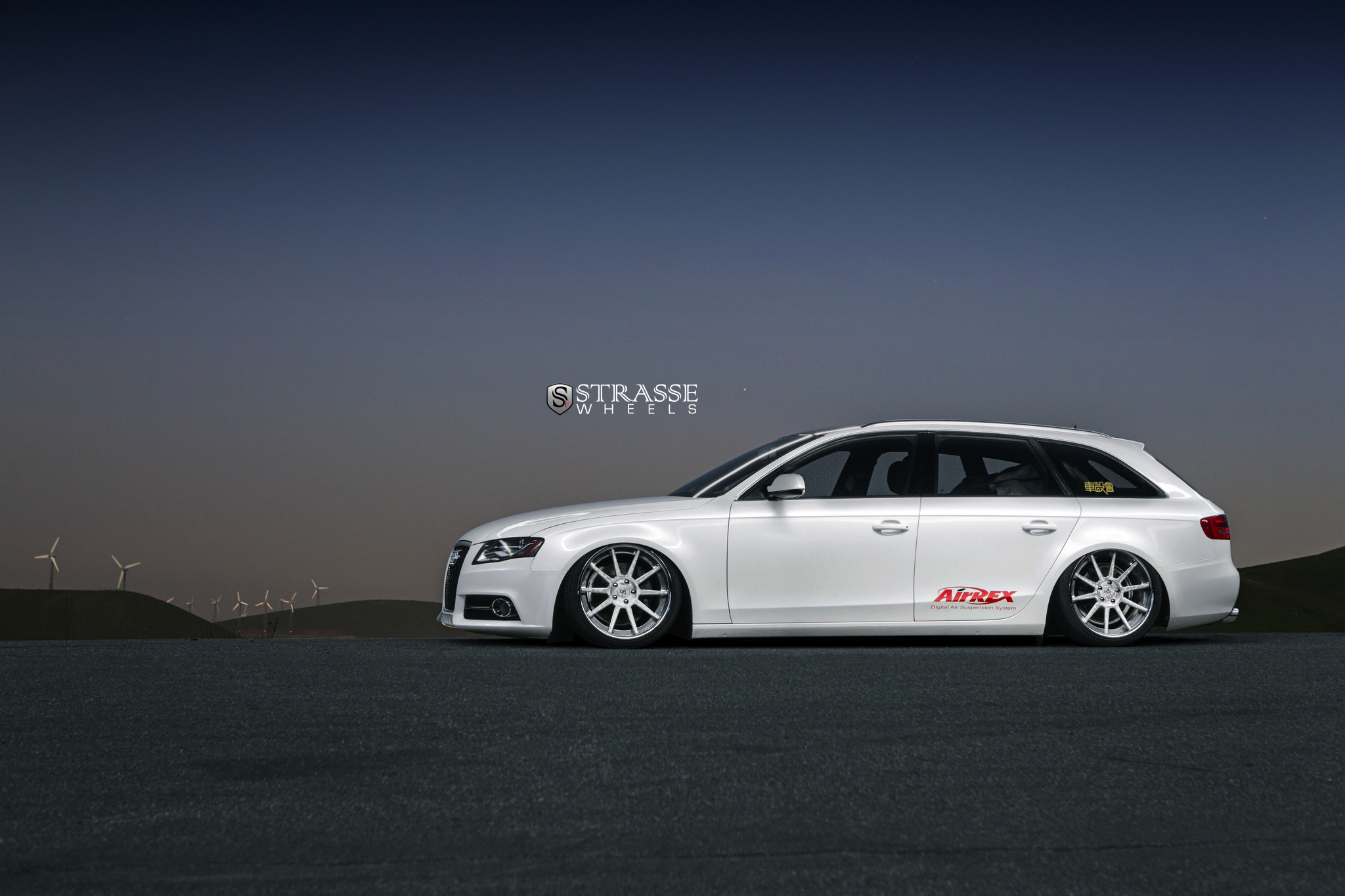 Brushed Titanium Strasse Rims on White Audi A4 - Photo by Strasse Forged