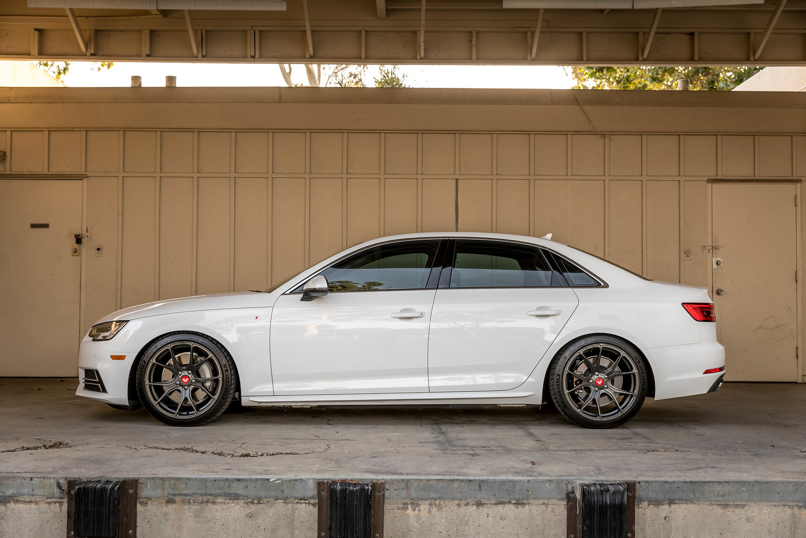 Custom White Audi A4 Side Skirts - Photo by Vorstiner