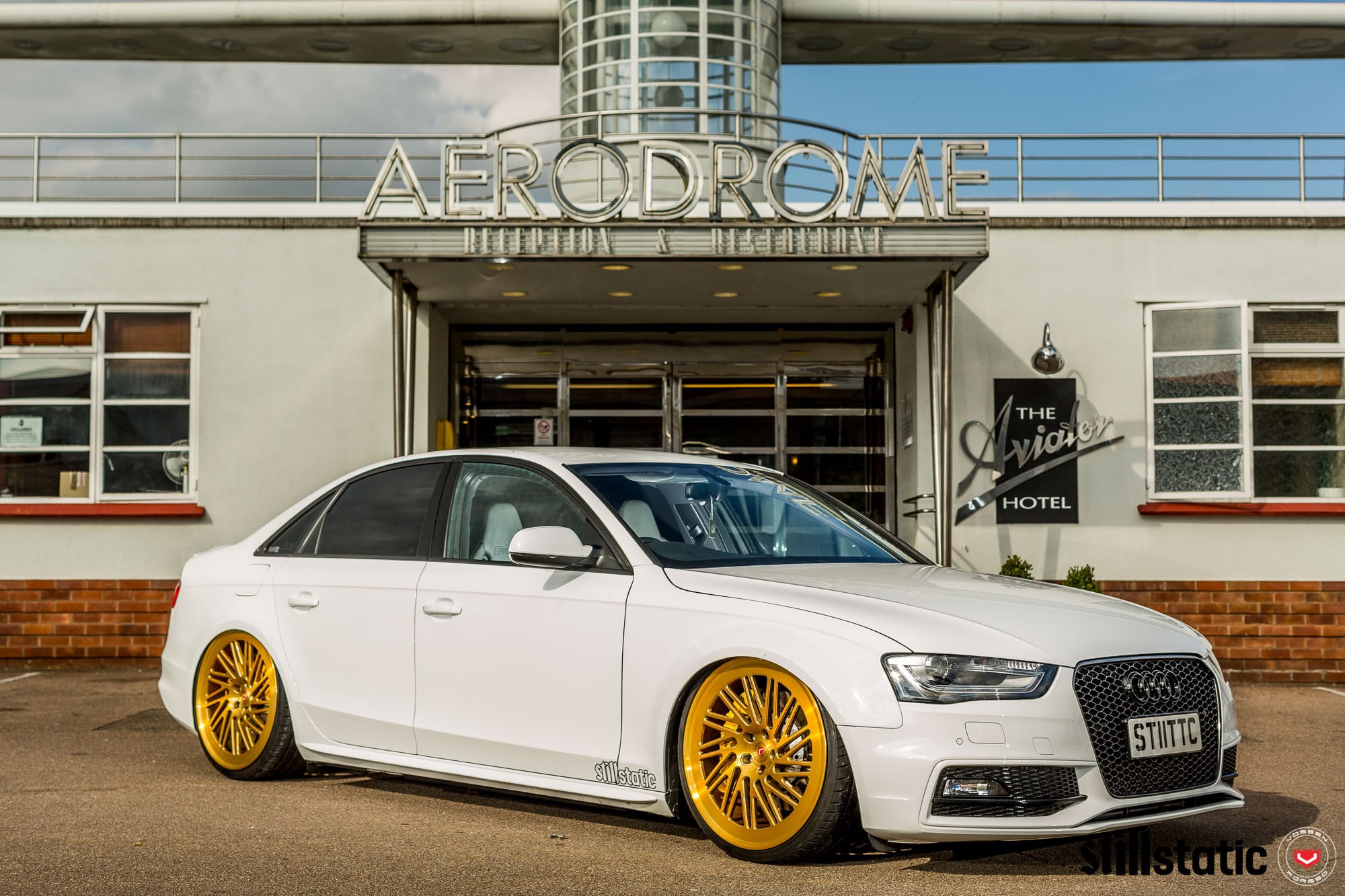 Custom White Audi A4 with Gold Wheels - Photo by Vossen