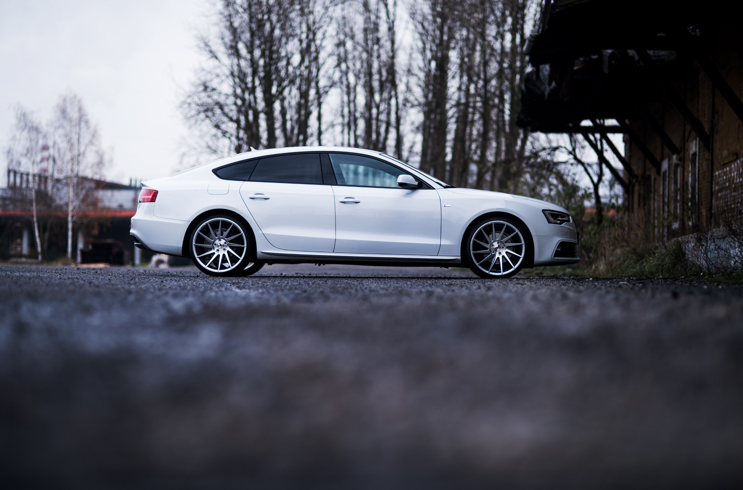 Aftermarket Side Skirts on White Audi A5 - Photo by JR Wheels