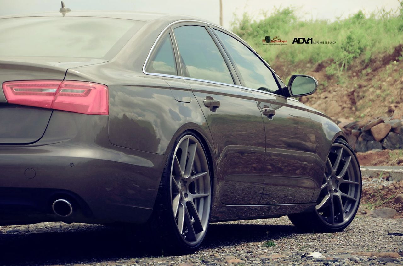 Aftermarket Red Taillights on Gray Audi A6 - Photo by ADV.1