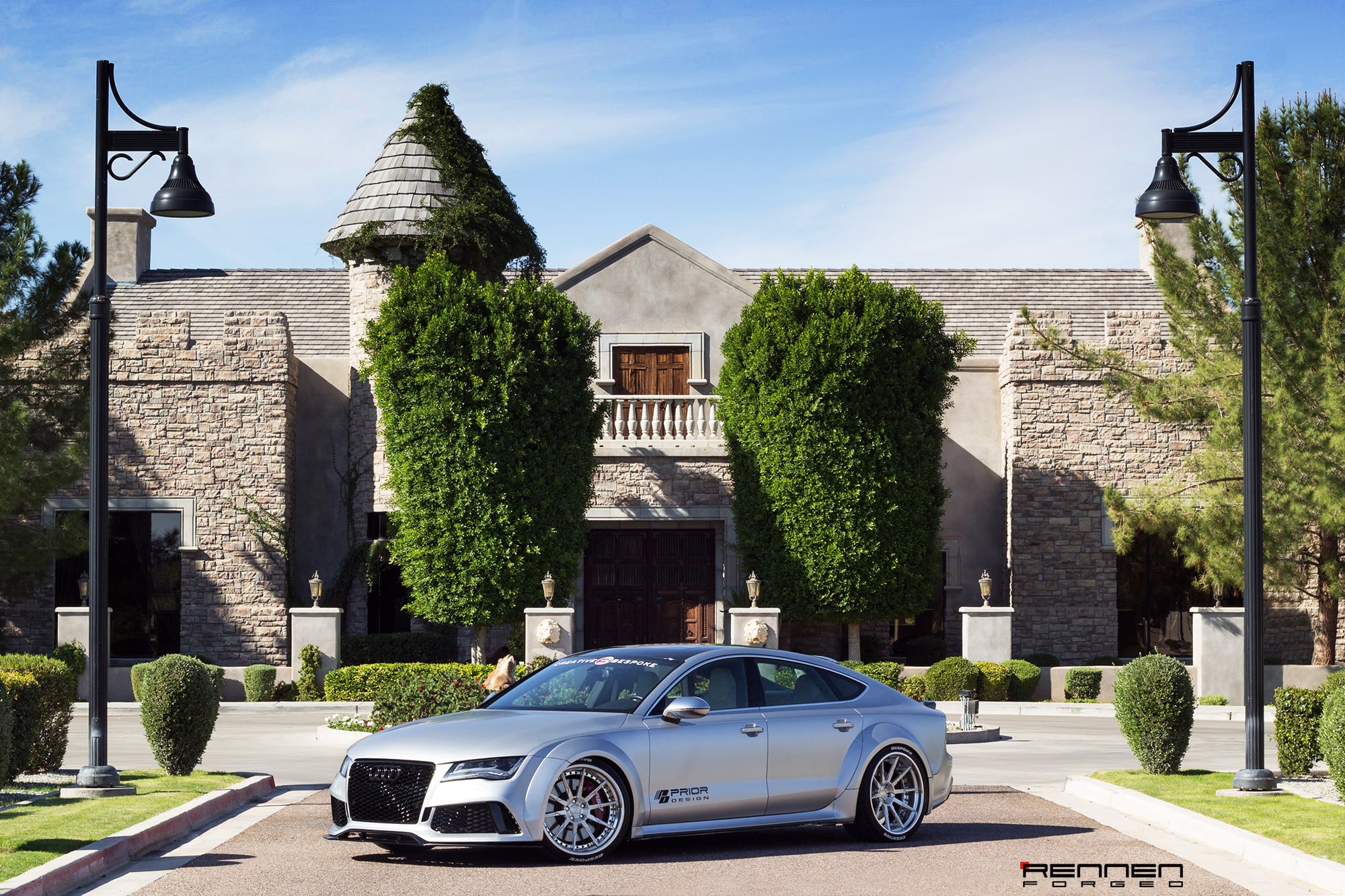 Custom LED Headlights on Silver Audi A7 - Photo by Rennen International