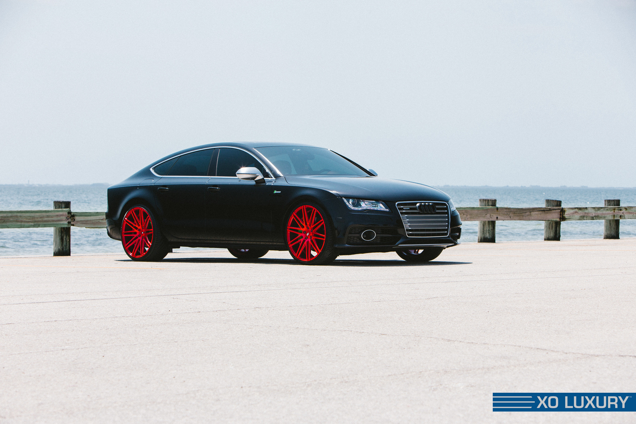 Lowered Audi A7 on Red Custom Wheels - Photo by XO Luxury