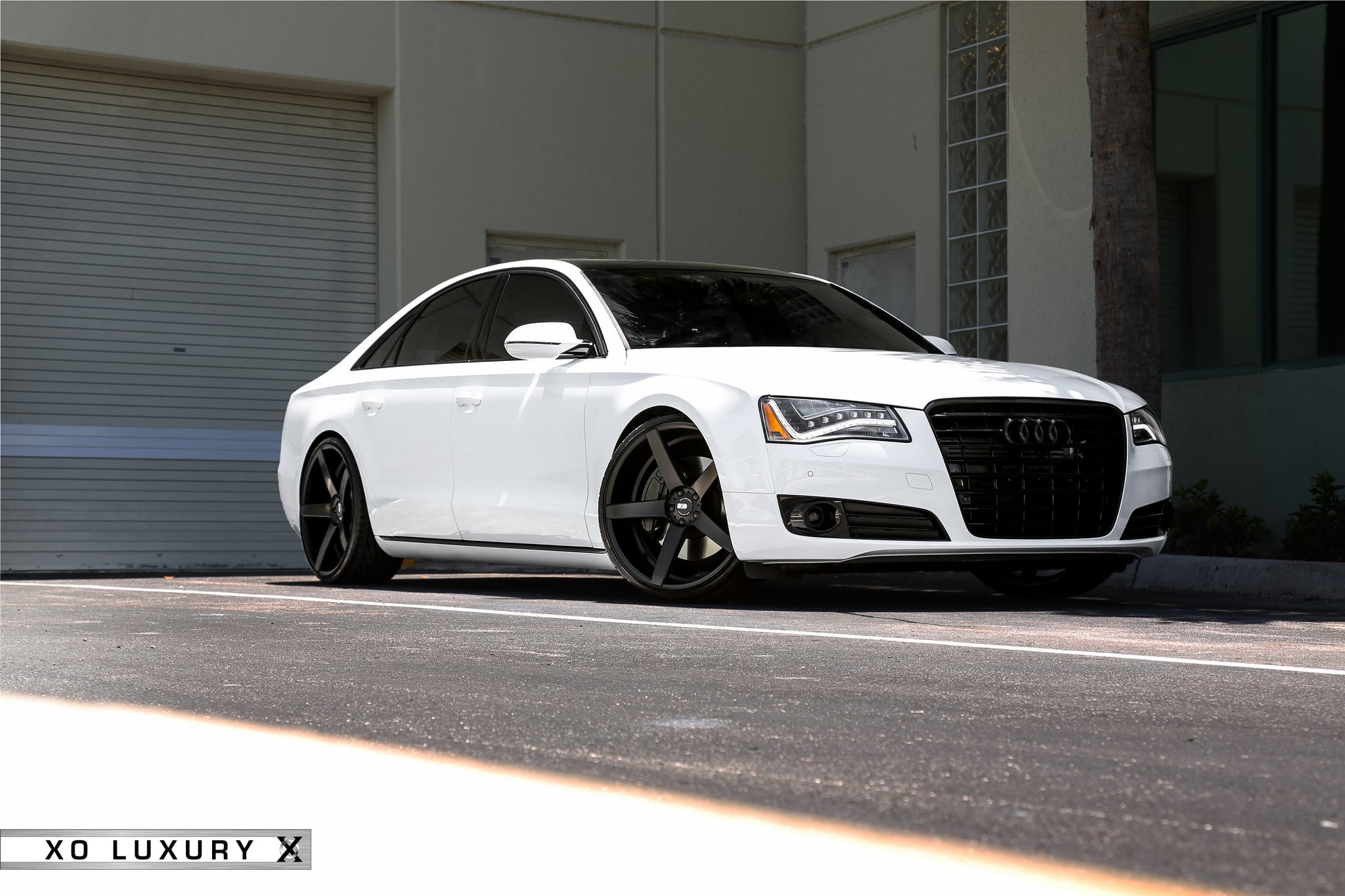 Gorgeous White Audi A8 Sedan on Black Custom Wheels - Photo by XO Luxury