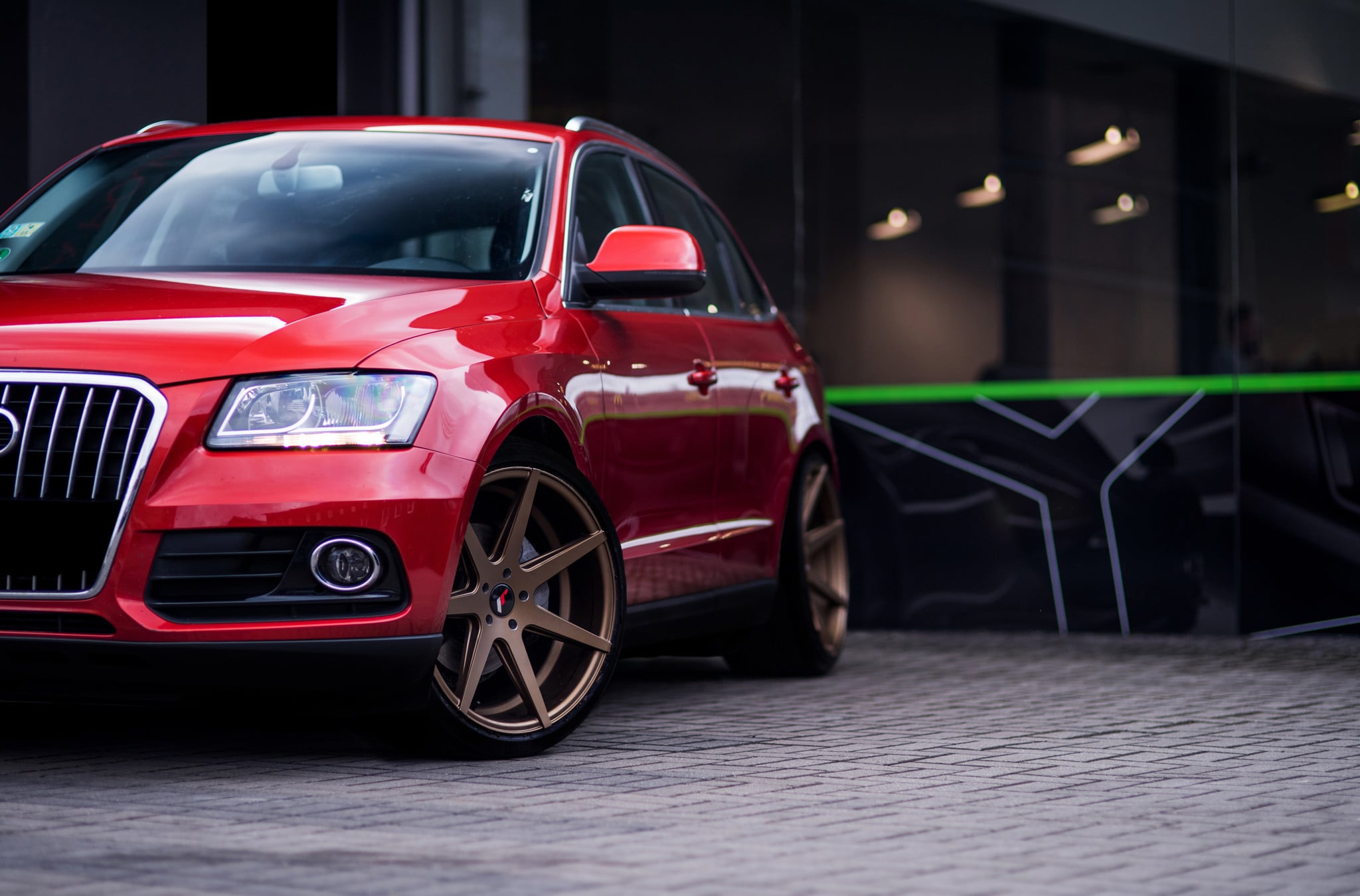 Front Bumper with Fog Lights on Red Audi Q5 - Photo by JR Wheels