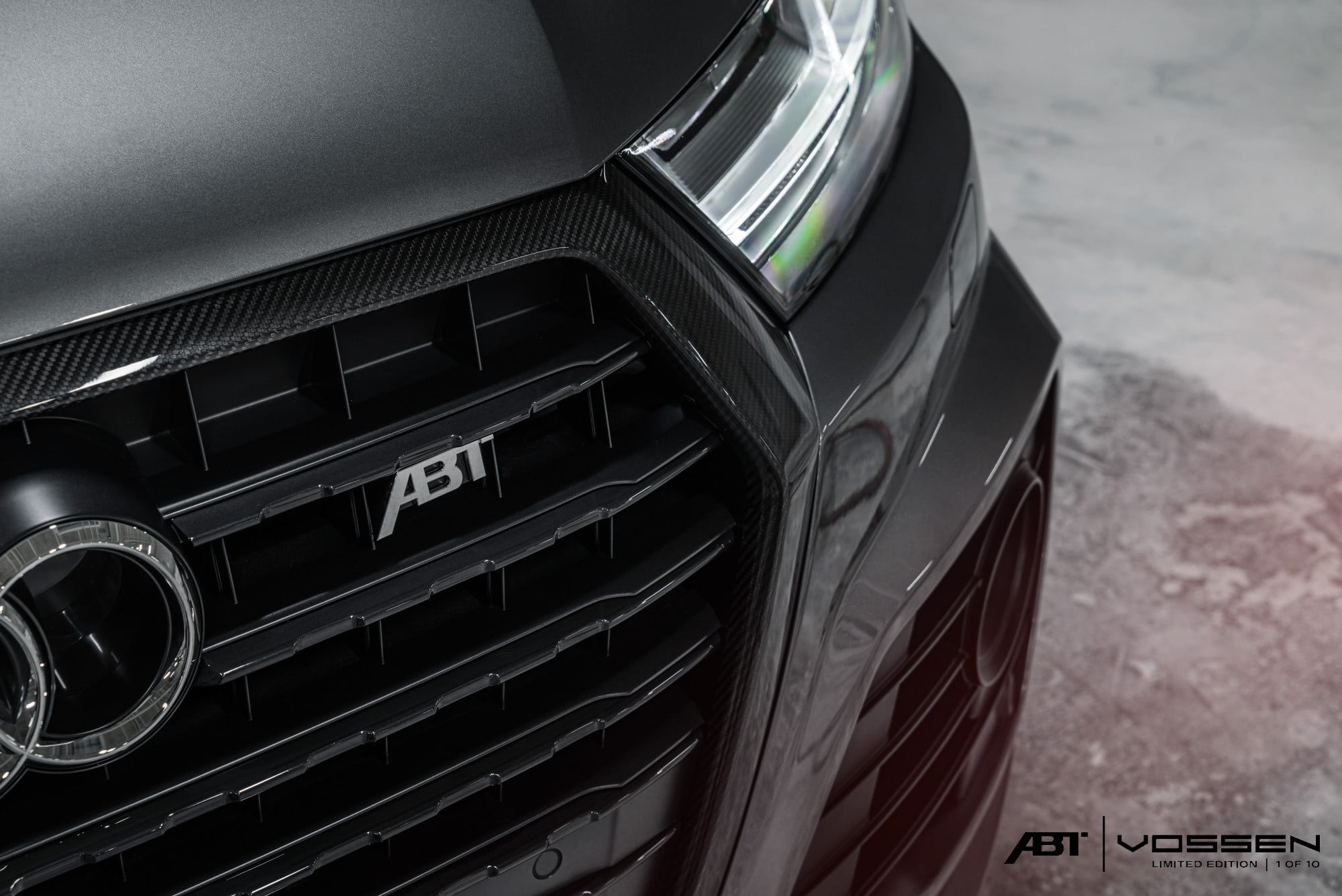 Carbon Fiber Grille Overlay on Black Audi Q7 - Photo by Vossen
