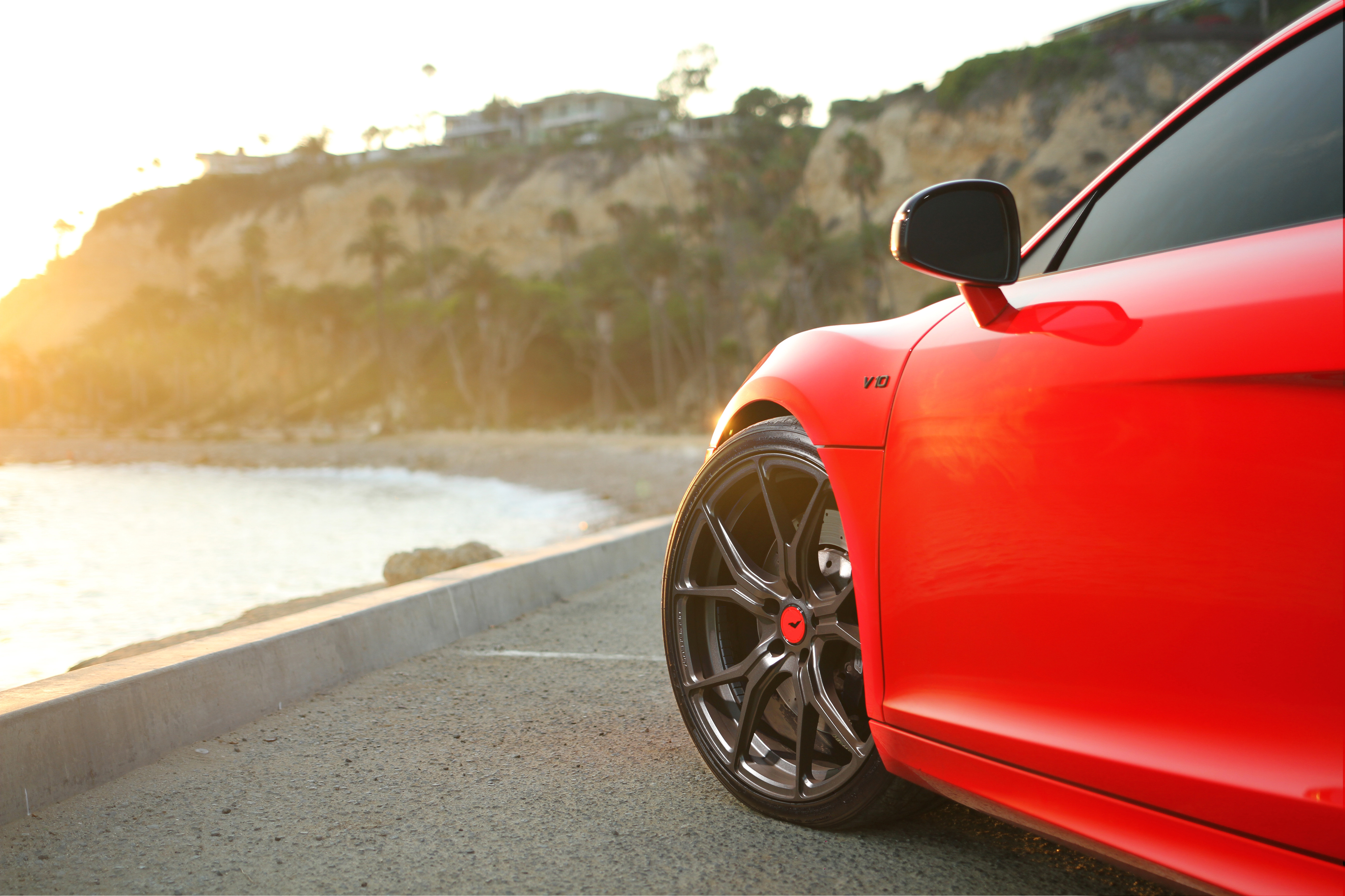 Red Audi R8 V6 with Aftermarket Side Skirts - Photo by Vorstiner