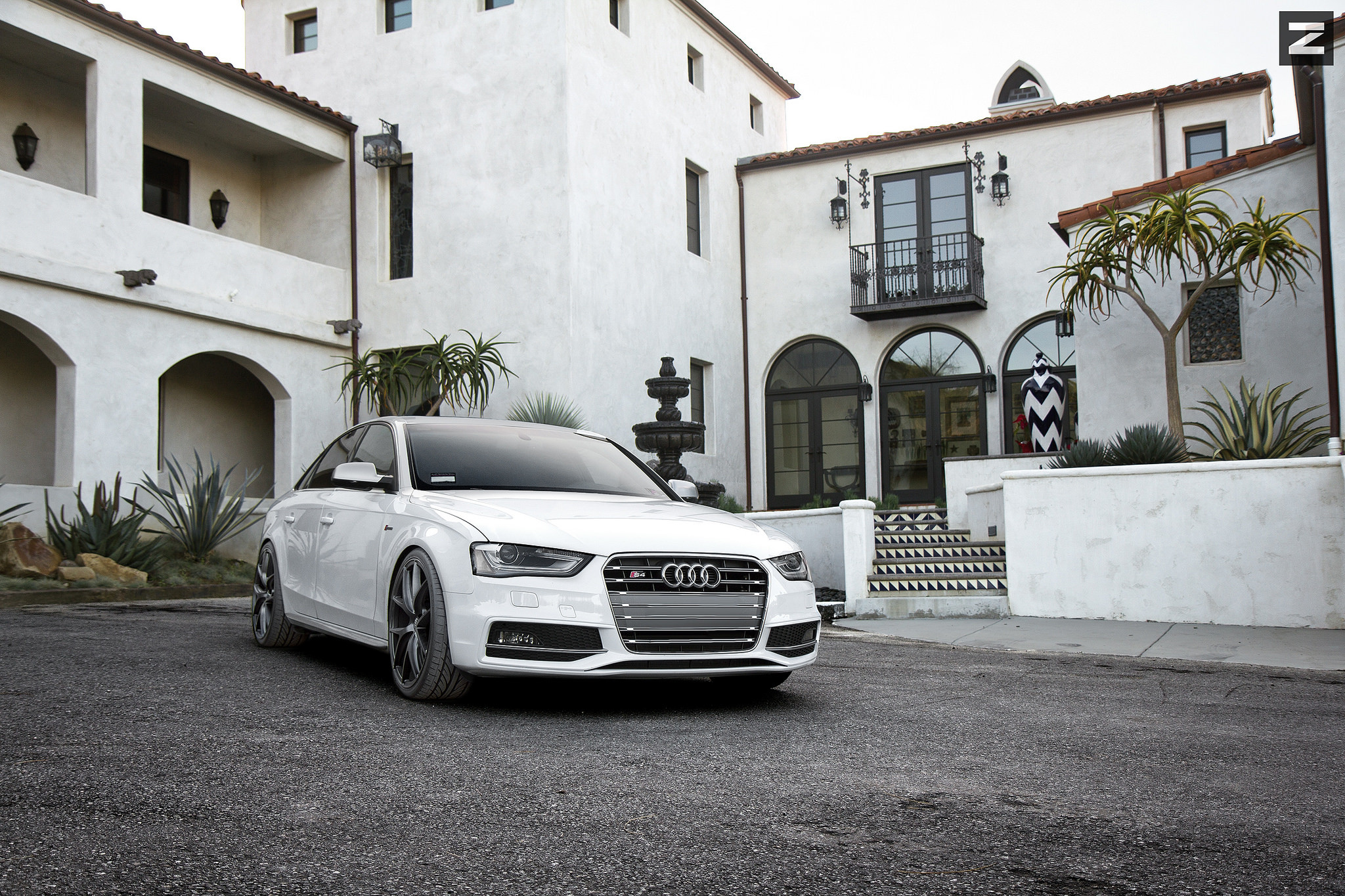 White Audi S4 with Aftermarket Headlights - Photo by Zito Wheels