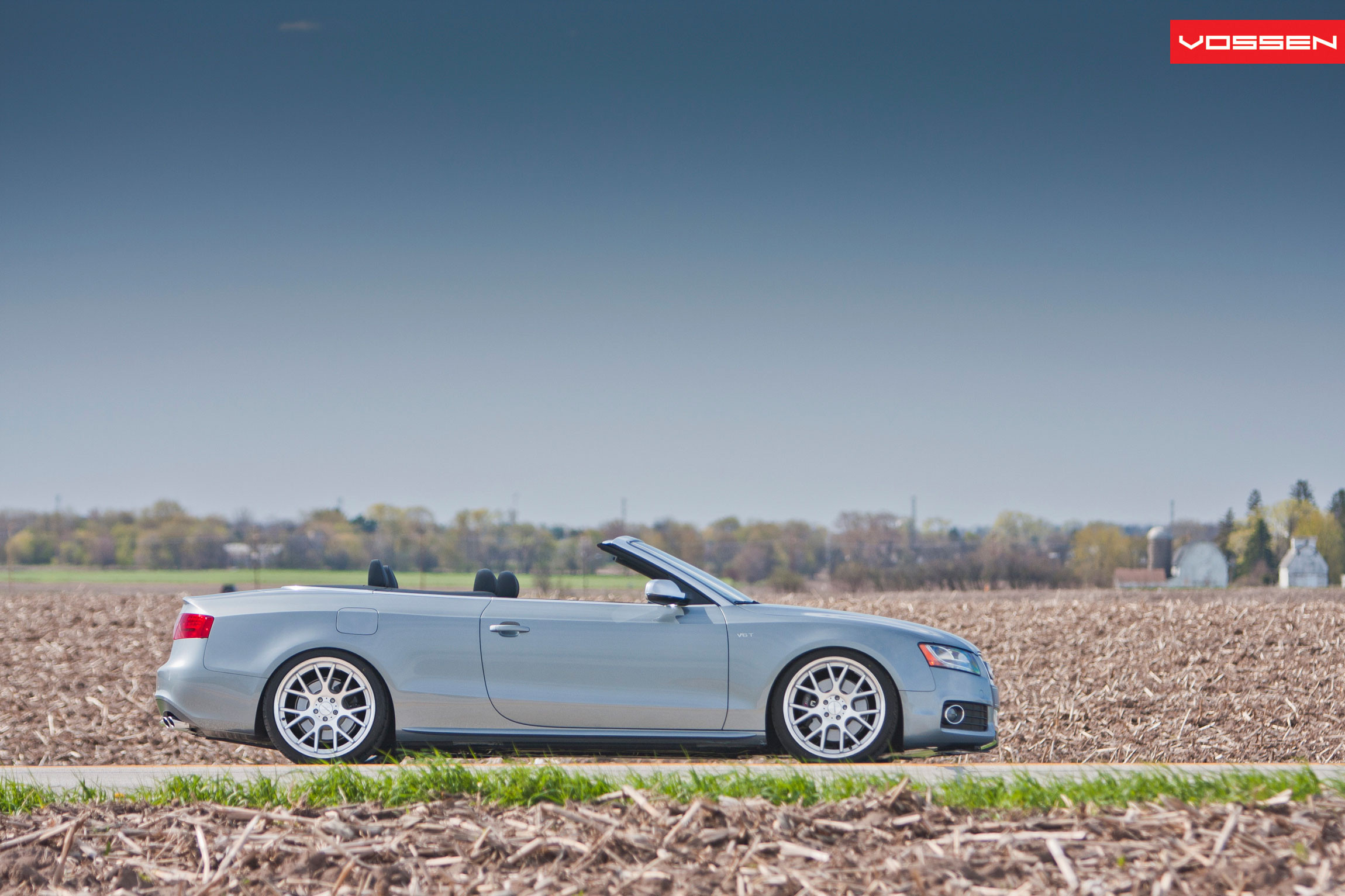 Silver Convertible Audi S5 with Aftermarket Side Skirts - Photo by Vossen