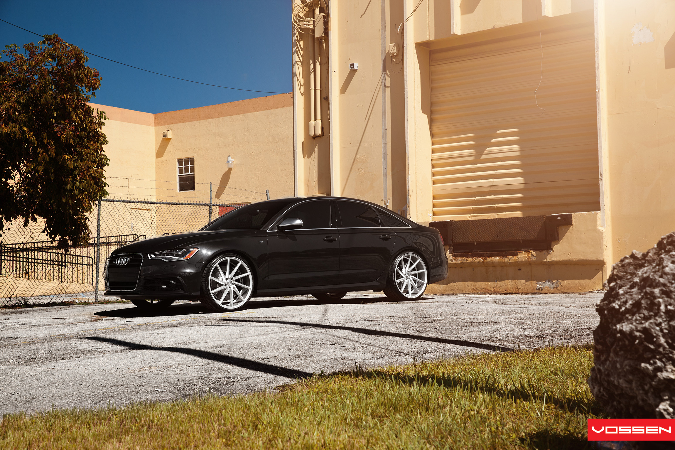 Black Audi S6 V8T with Aftermarket Headlights - Photo by Vossen