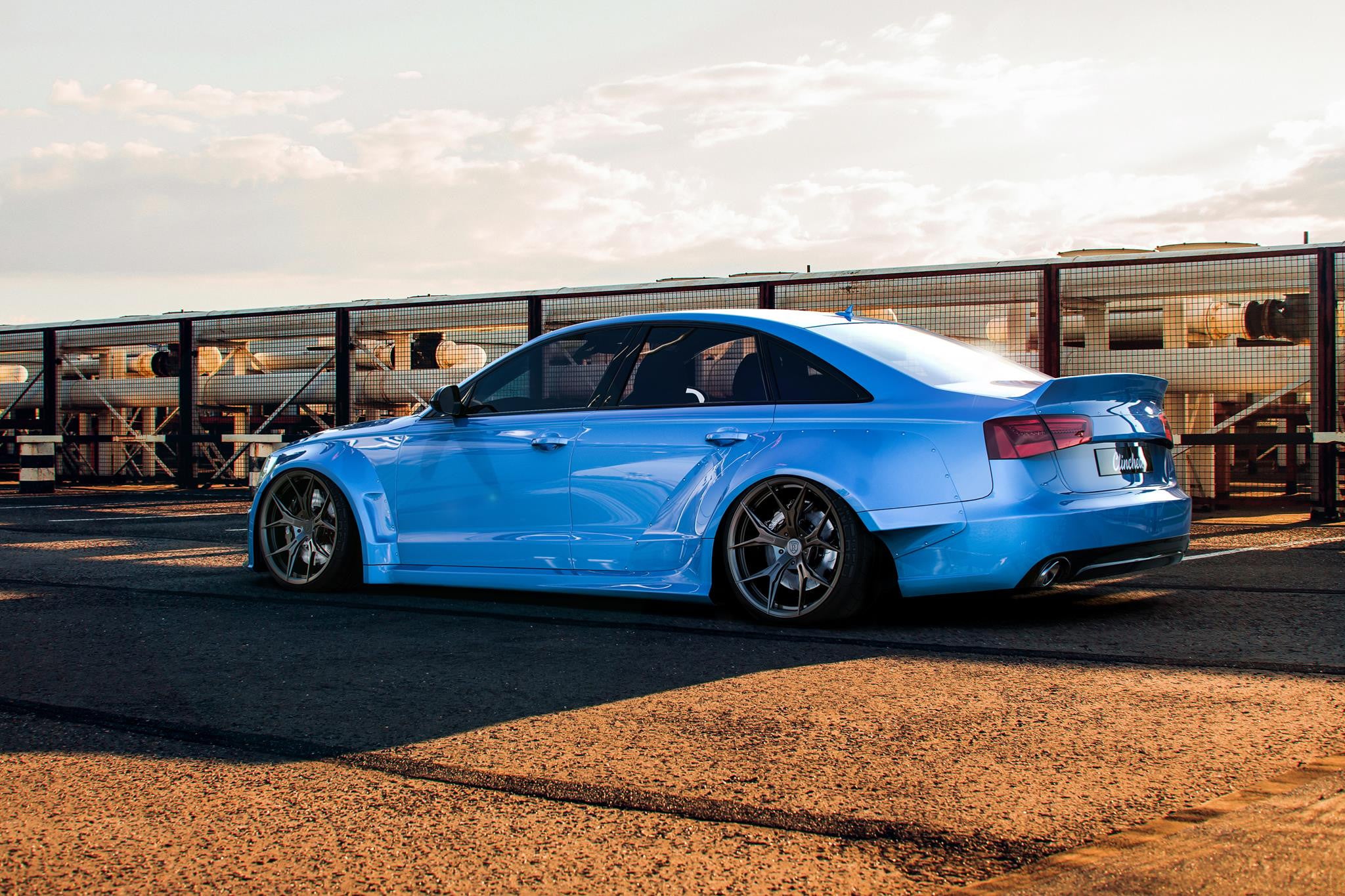 Custom Blue Audi S6 Wide Fender Flares - Photo by Clinched