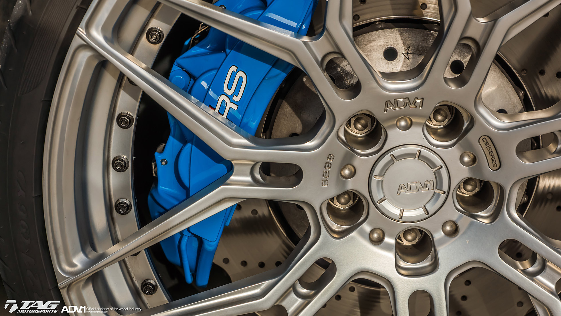 ADV1 Wheels with Blue Brakes on White Audi RS7 - Photo by ADV.1