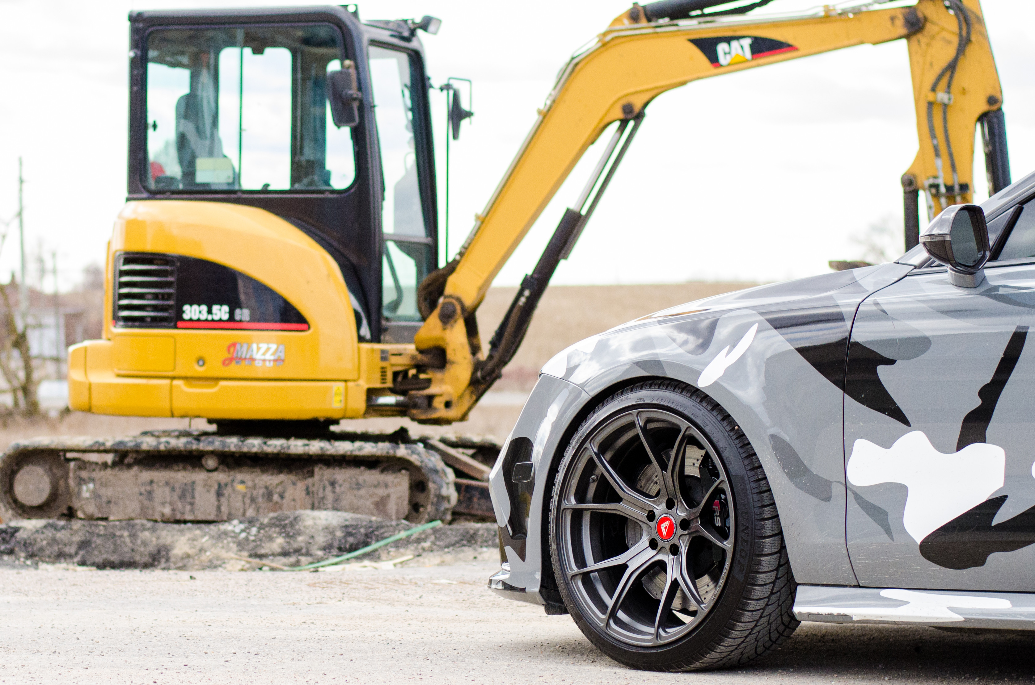 Aftermarket Side Skirts on Camo Audi S7 - Photo by Vorstiner