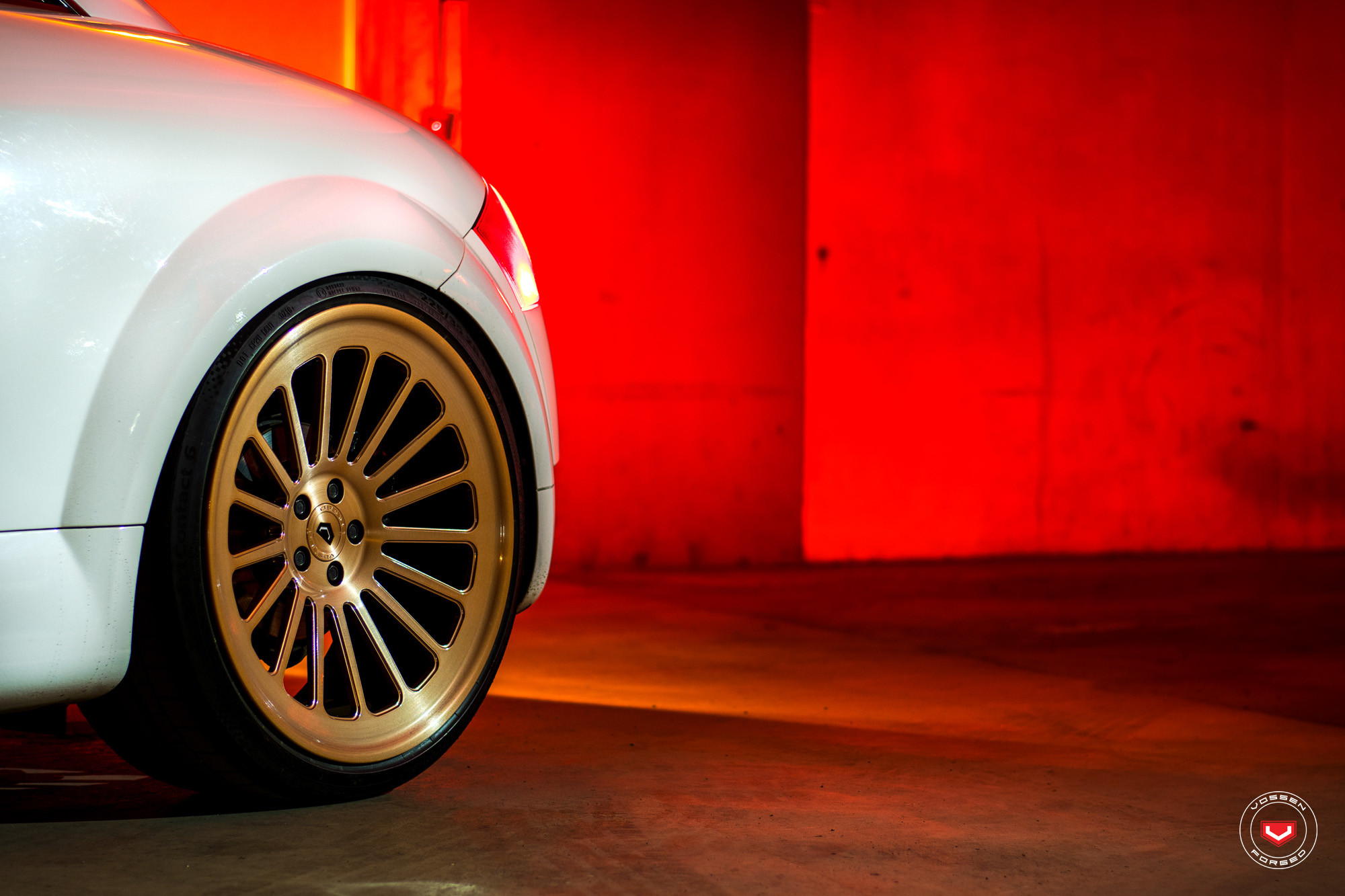 Bronze Vossen Rims With Black Center Caps - Photo by Vossen