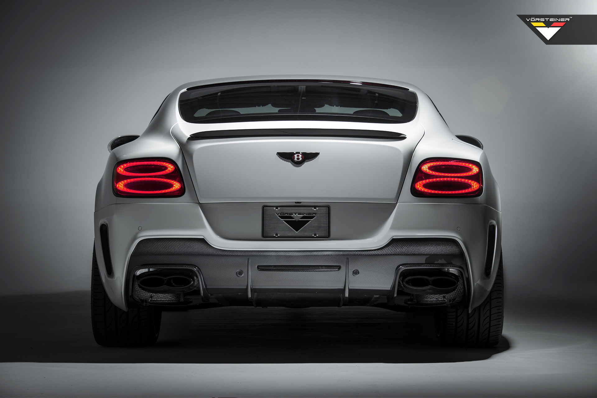 Carbon Fiber Rear Diffuser on White Bentley Continental - Photo by Vorstiner