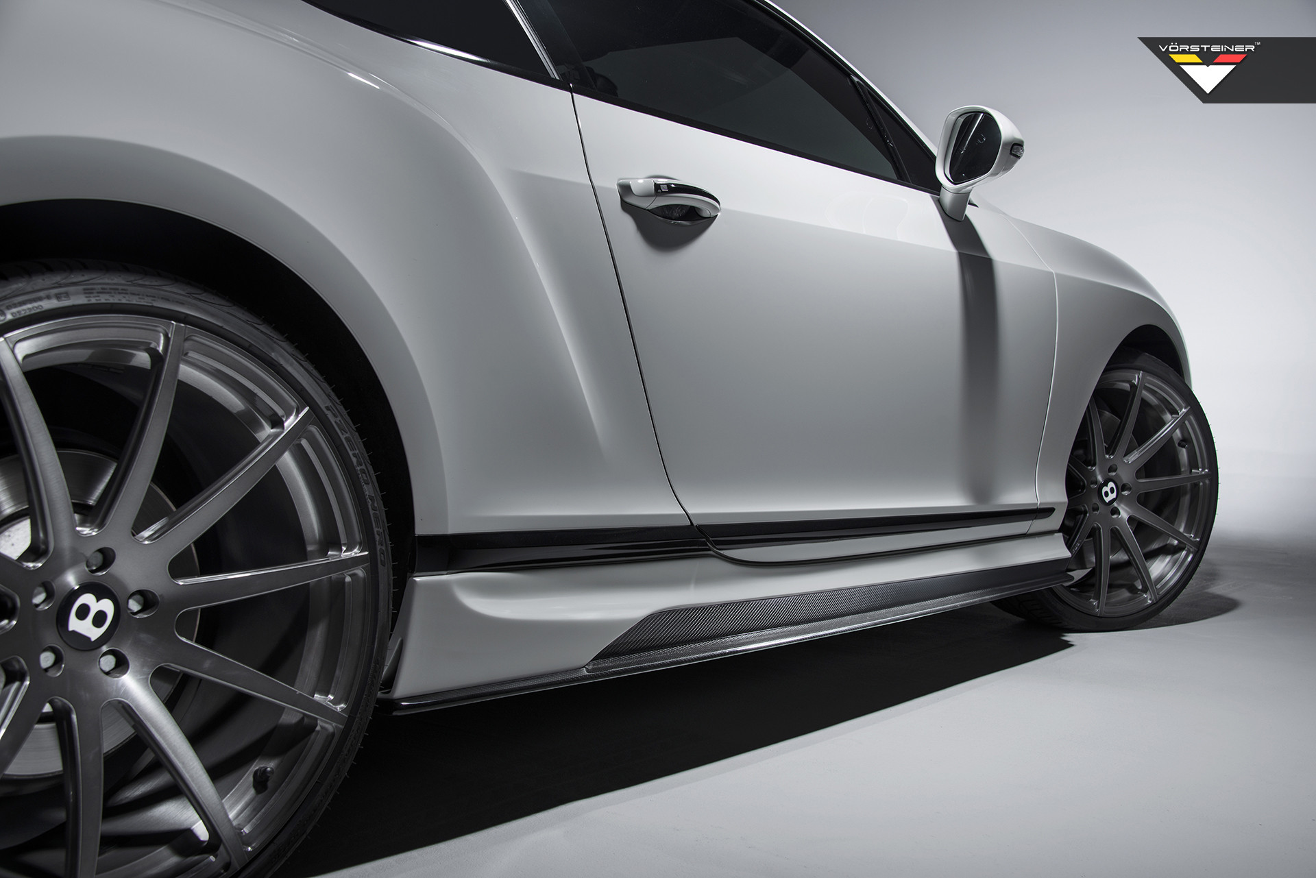 Carbon Fiber Side Skirts on White Bentley Continental - Photo by Vorstiner