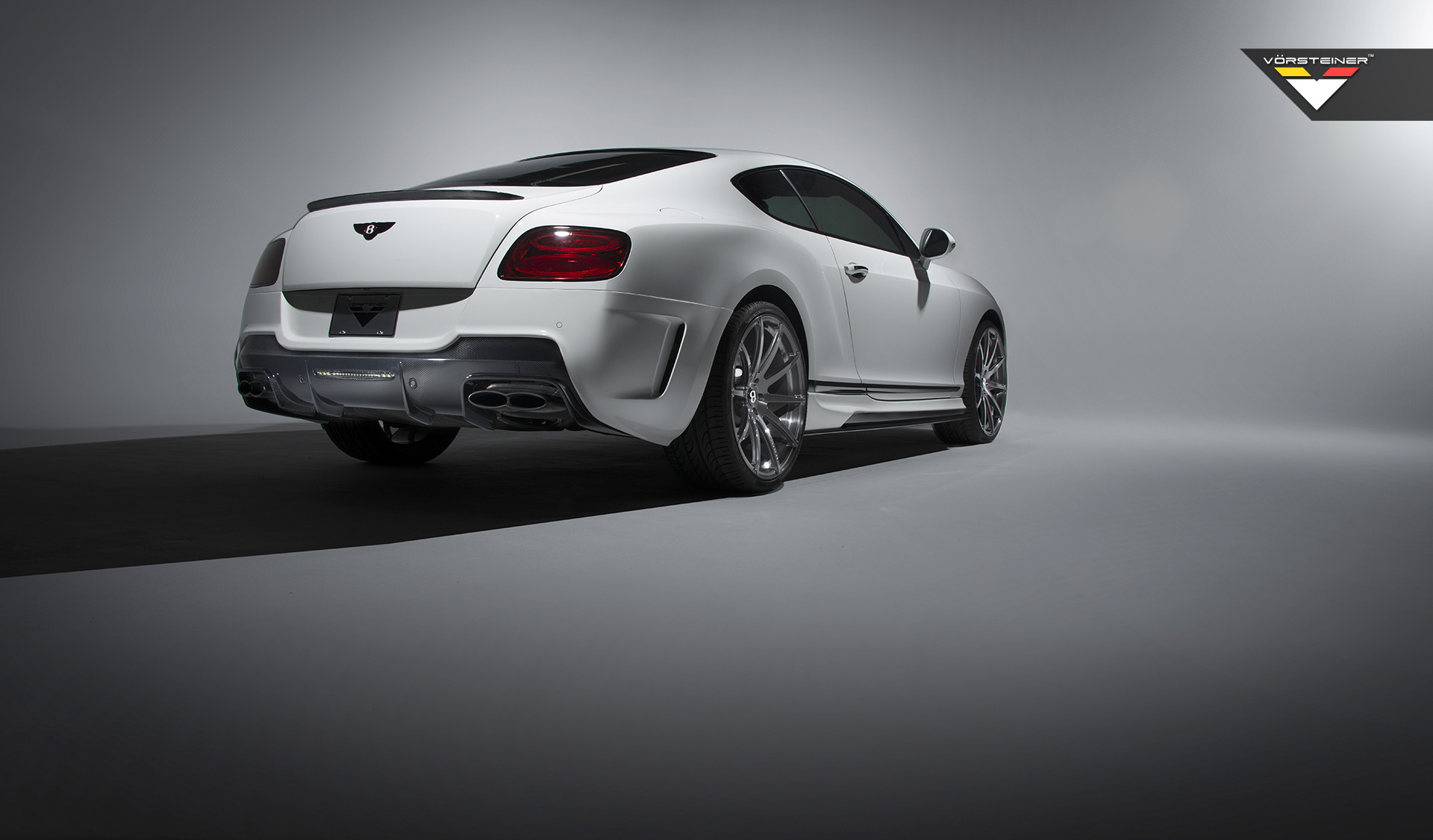 Carbon Fiber Lip Spoiler on White Bentley Continental - Photo by Vorstiner