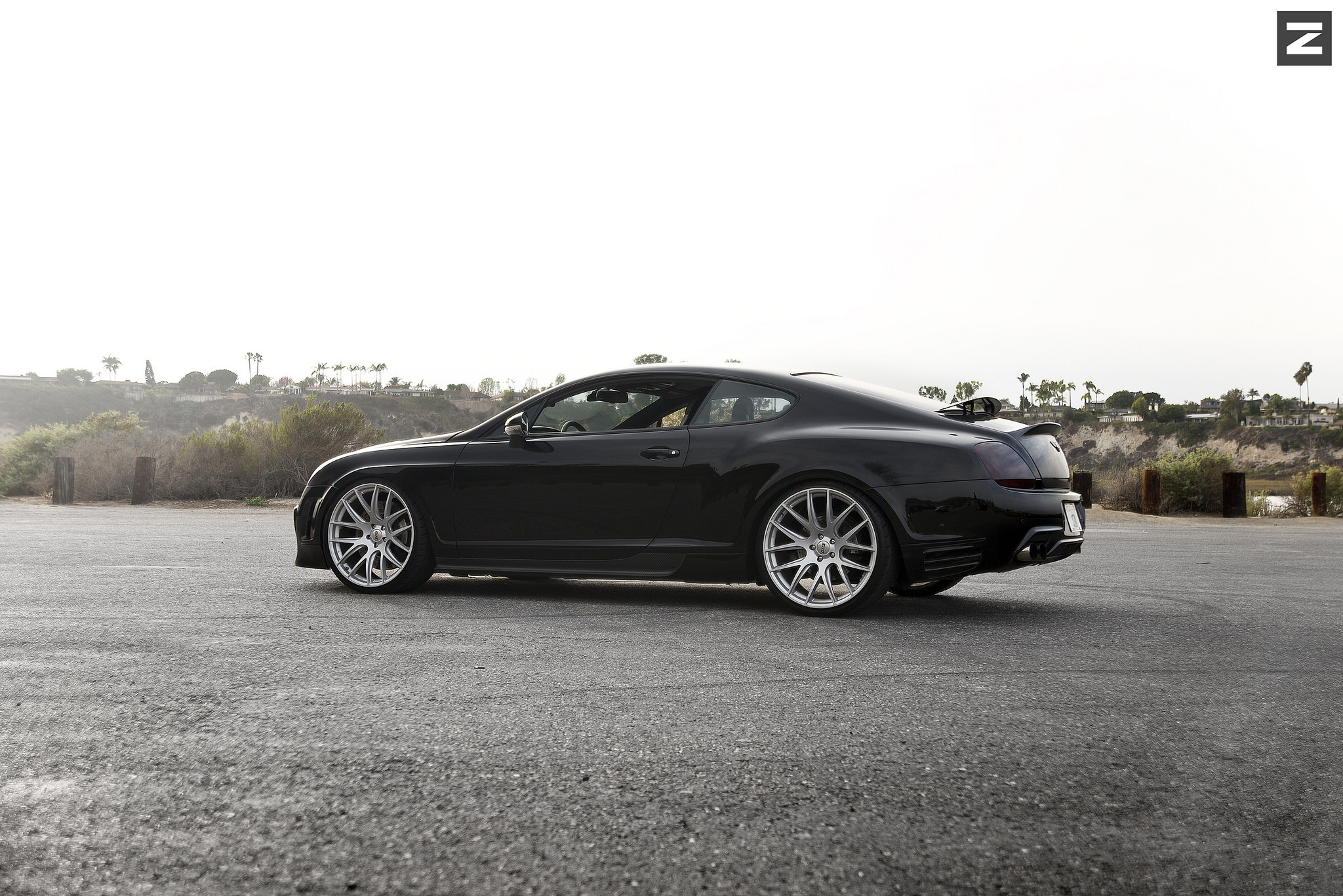 Black Bentley Continental with Carbon Fiber Side Skirts - Photo by Zito Wheels
