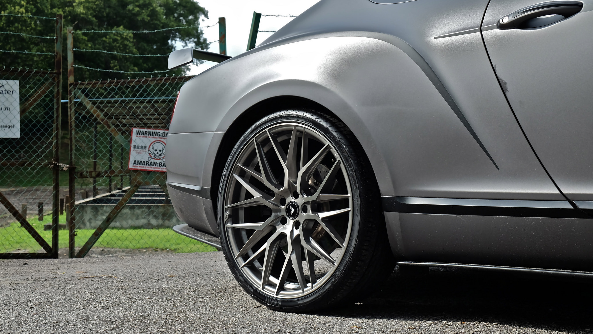 Aftermarket Side Skirts on Gray Matte Bentley Continental - Photo by Vorsteiner