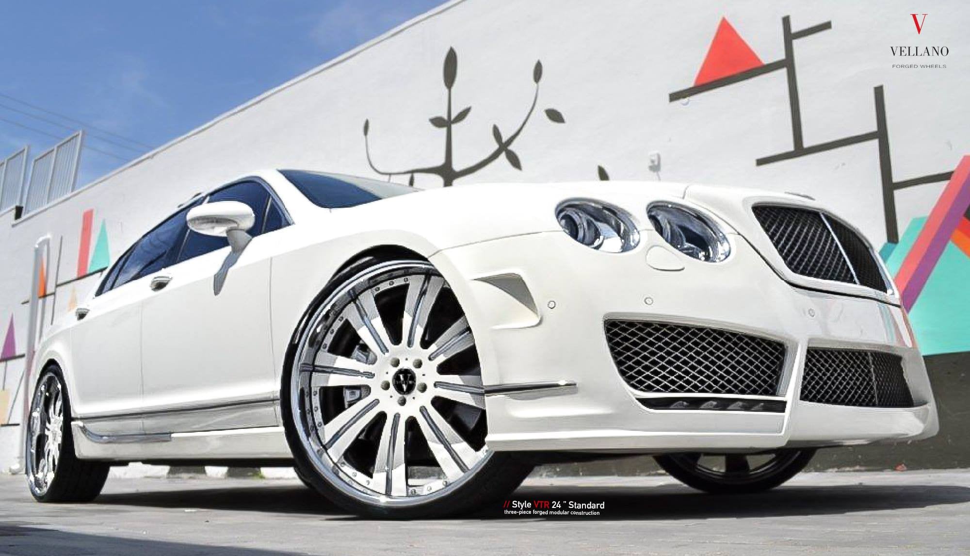 White Bently Flying Spur with Chrome Grille - Photo by Vellano