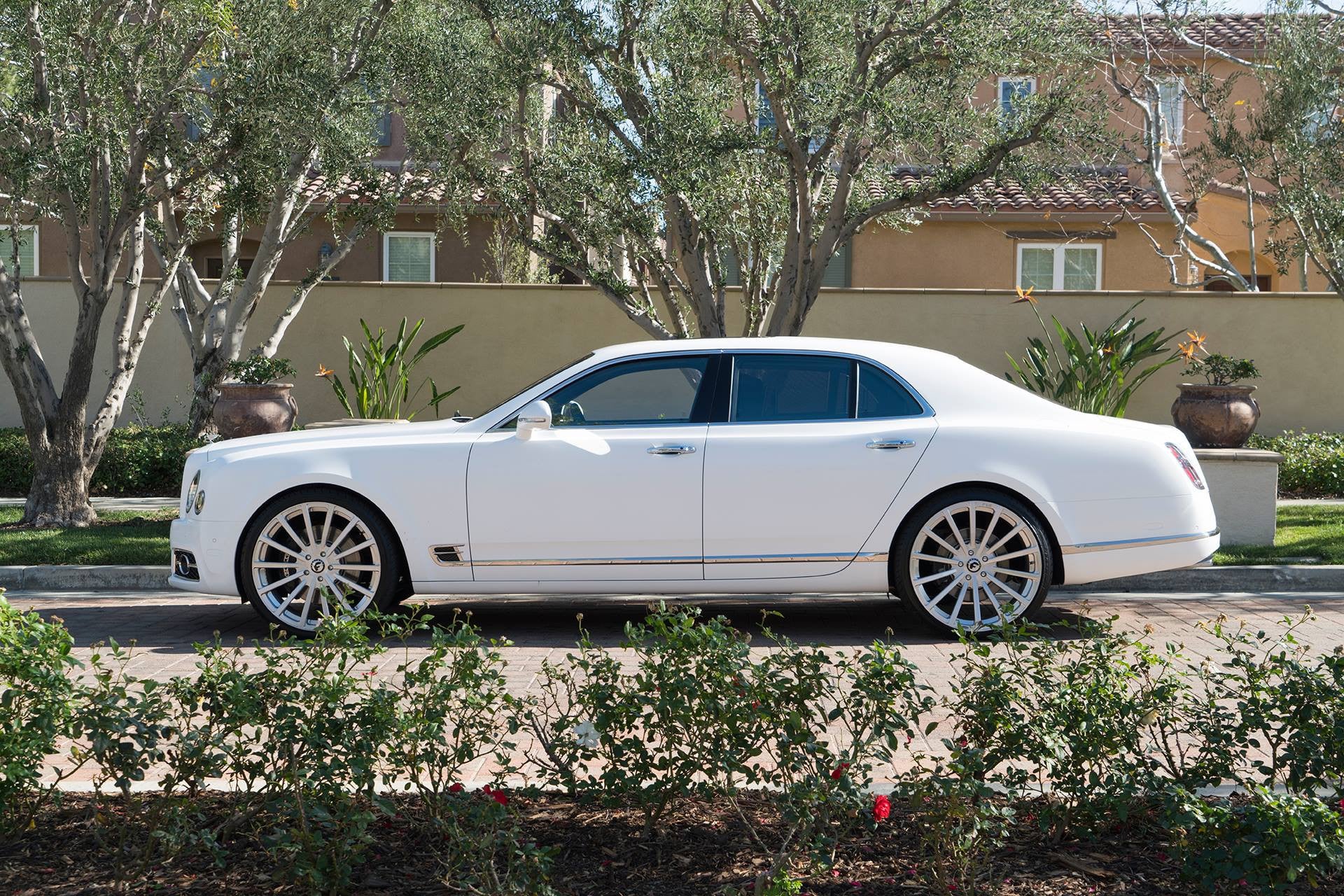 Custom White Bentley Mulsanne with Chrome Bodyside Moldings - Photo by Forgiato