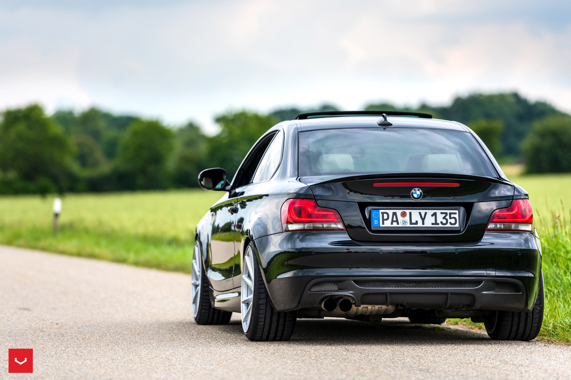 Revised Rear End of Gloss Black BMW 1-Series | CARiD.com Gallery