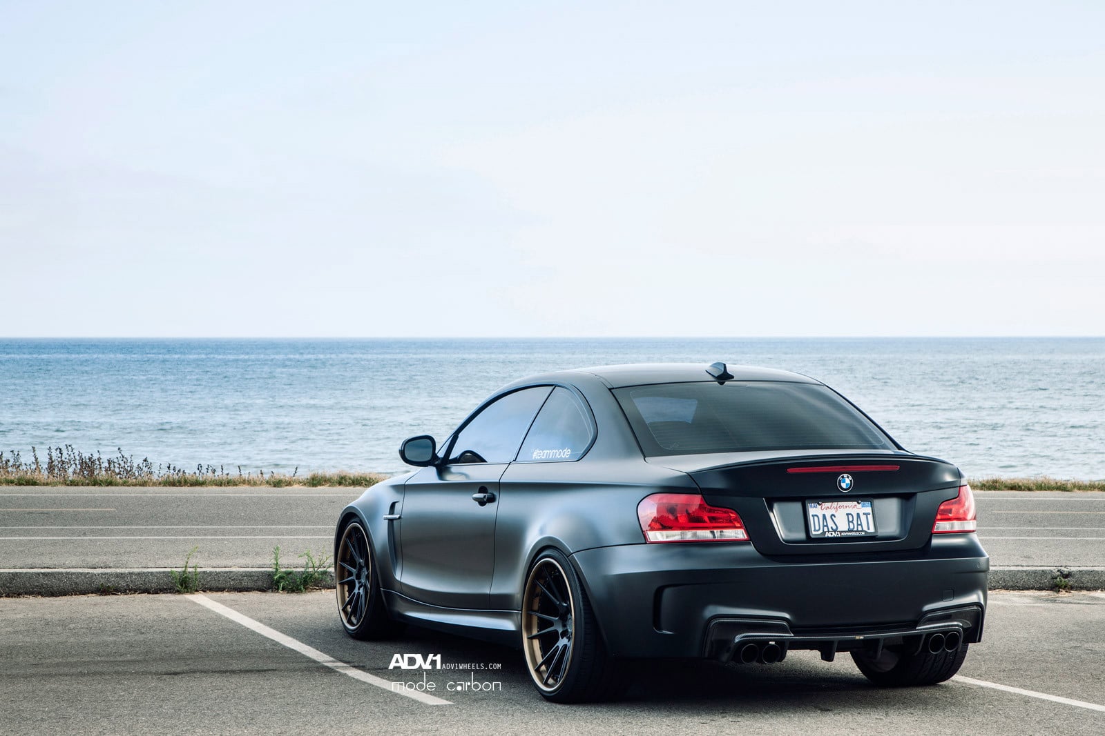 Carbon Fiber Rear Diffuser on Black Matte BMW 1-Series - Photo by ADV.1