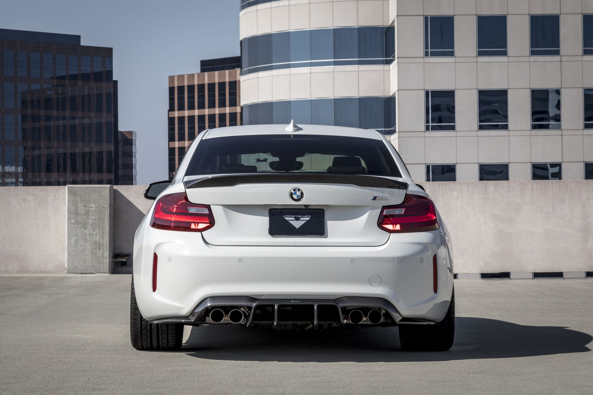 Carbon Fiber Lip Spoiler on White BMW 2-Series - Photo by Vorstiner