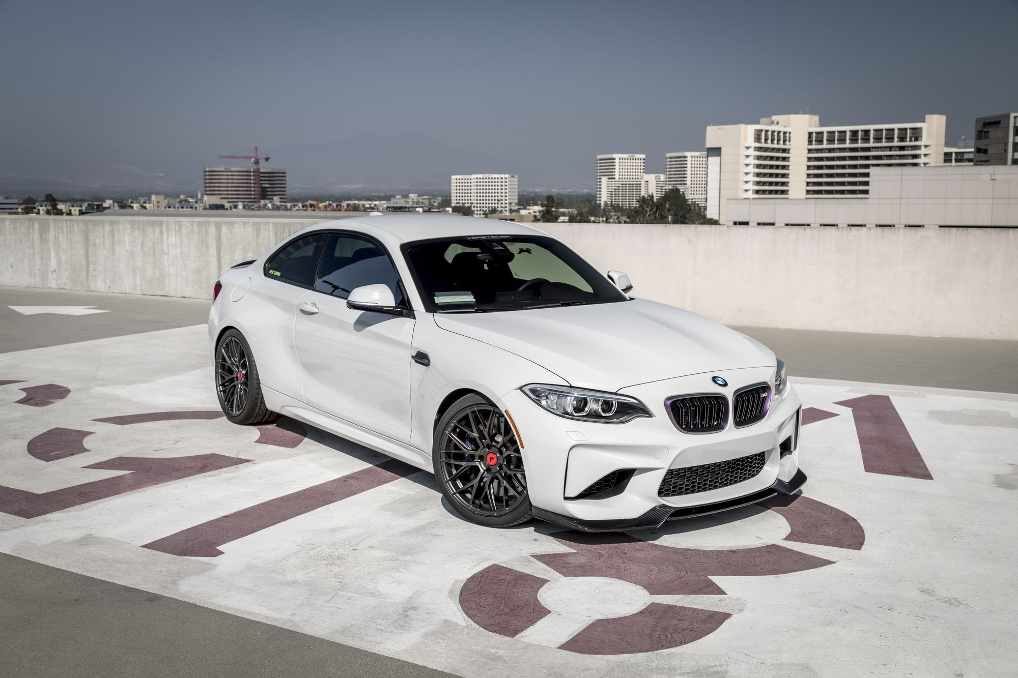 White BMW 2-Series with Aftermarket Side Skirts - Photo by Vorstiner
