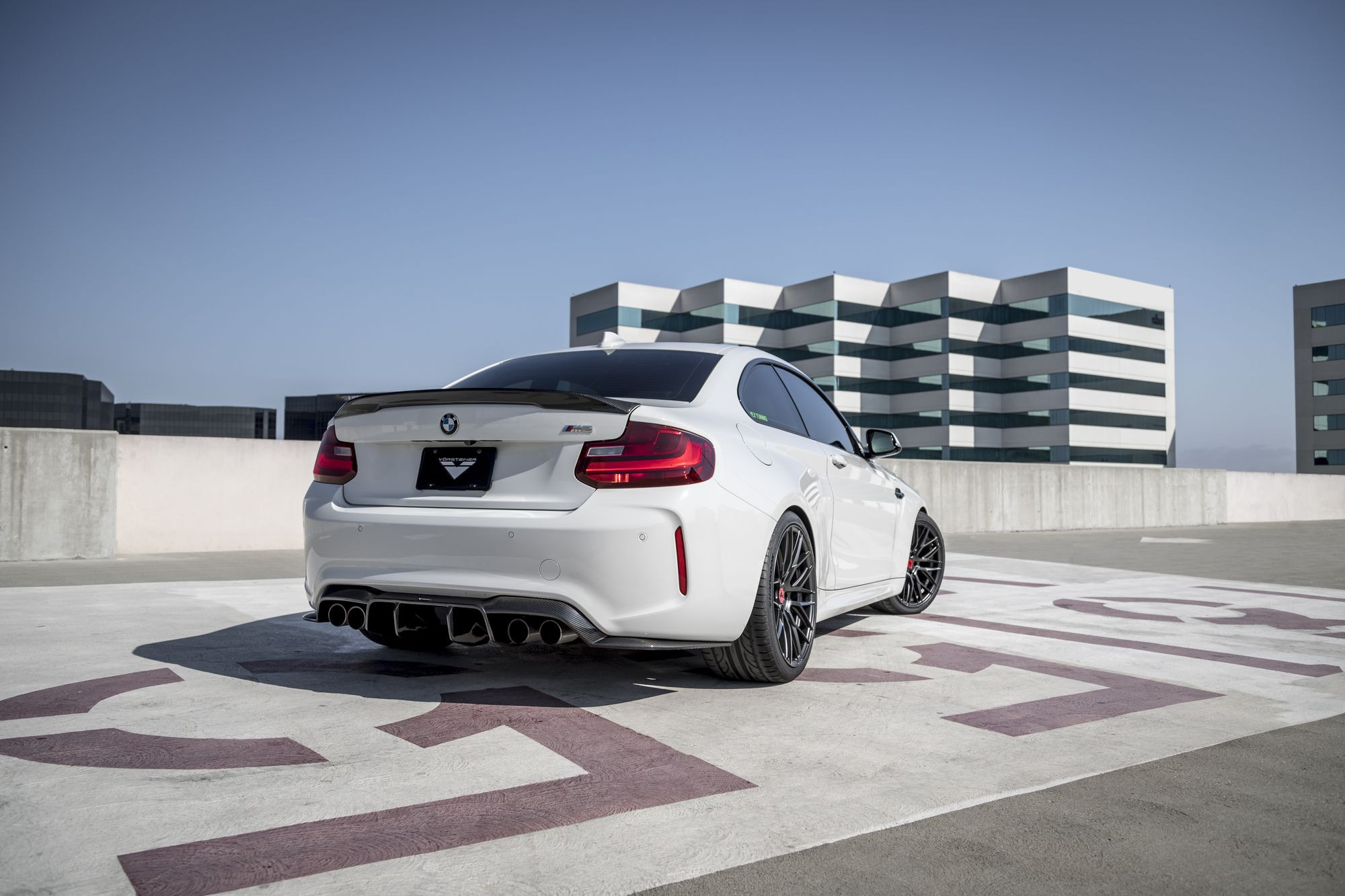 Carbon Fiber Rear Diffuser on White BMW 2-Series - Photo by Vorstiner