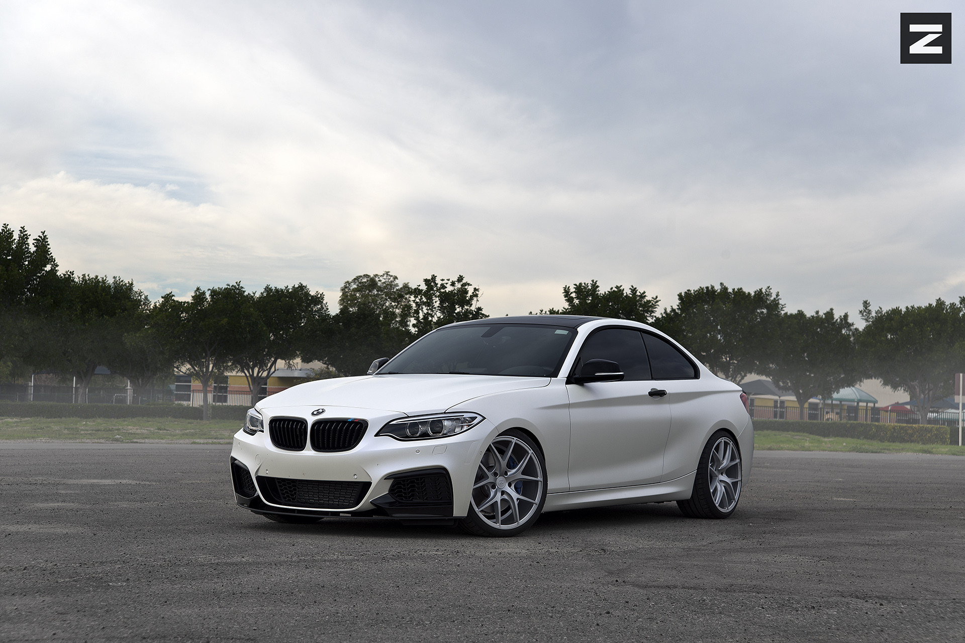Aftermarket Front Bumper on White BMW 2-Series - Photo by Zito Wheels