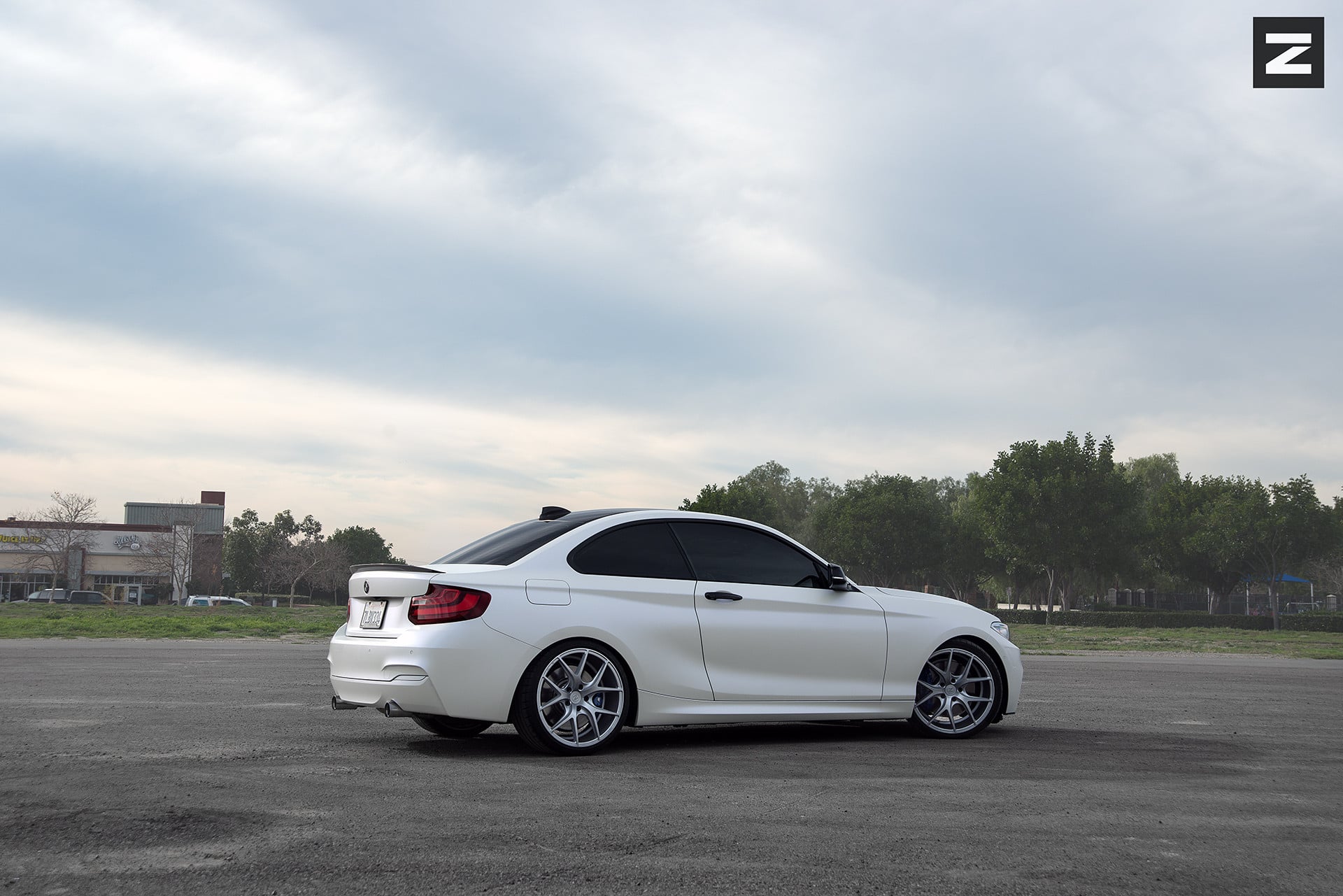 Chrome Zito Wheels on White BMW 2-Series - Photo by Zito Wheels