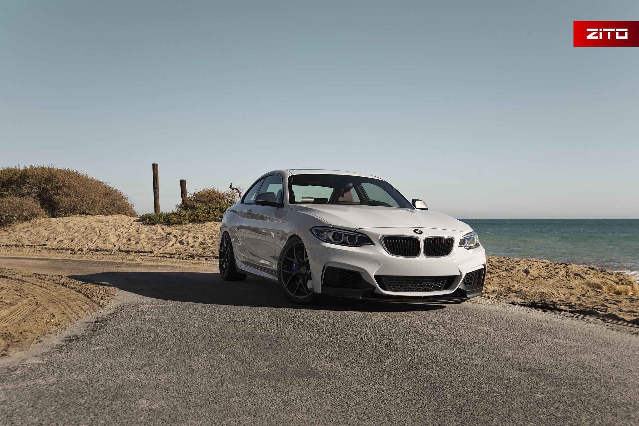 White BMW 2-Series with Custom Front Bumper Cover - Photo by Zito Wheels